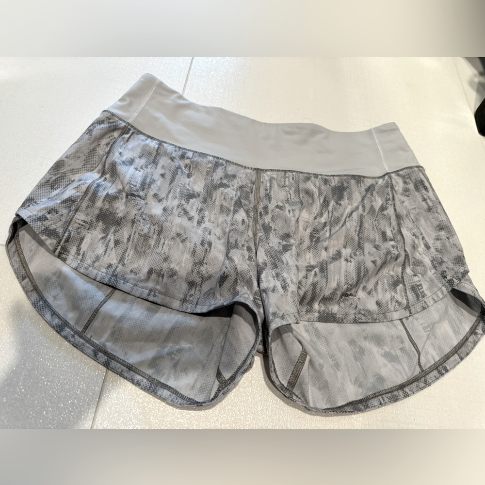Lululemon Speed Up lined run short; light gray/blue camouflage; women’s size 6